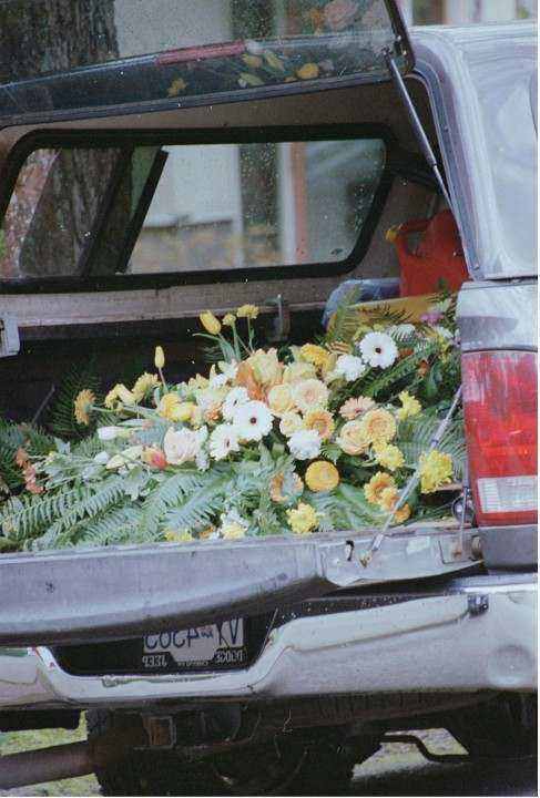 Florist arranging seasonal flowers